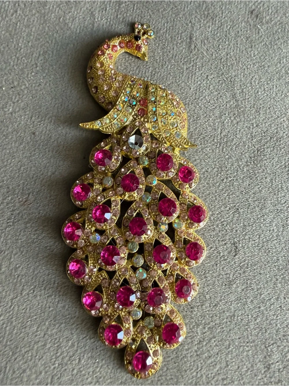 Gold-Tone Peacock Brooch with Fuchsia and Aurora Rhinestones